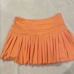 Gold Hinge Pleated Orange Mini Skirt